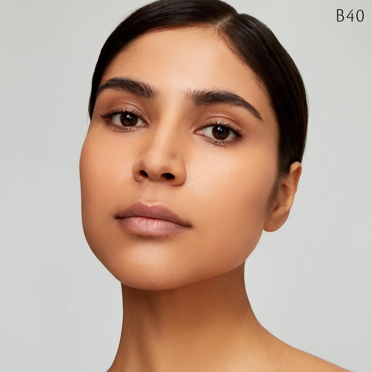Radiant Fluid Foundation Natural Broad Spectrum SPF 25 Sunscreen - Image 50