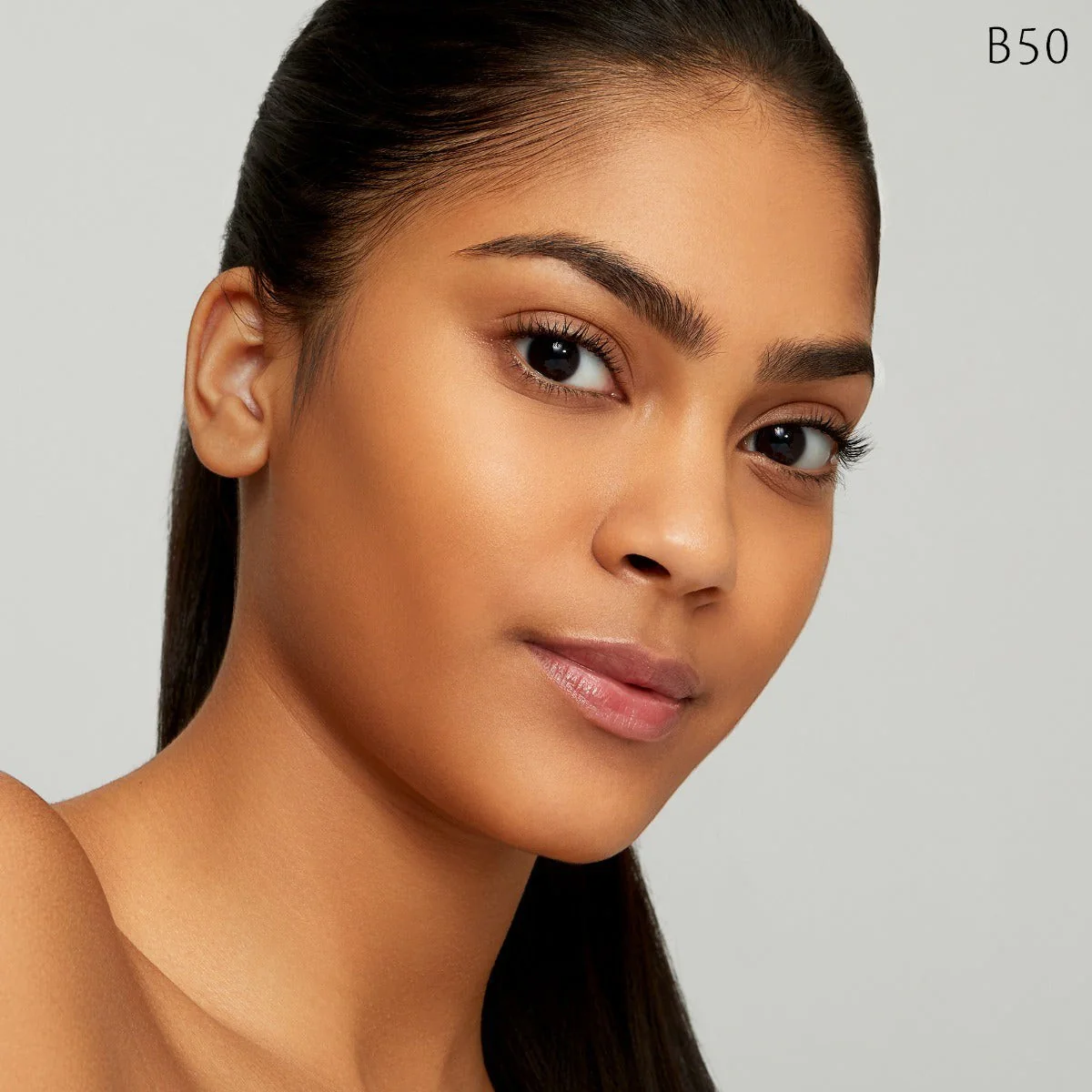 Radiant Fluid Foundation Natural Broad Spectrum SPF 25 Sunscreen - Image 52