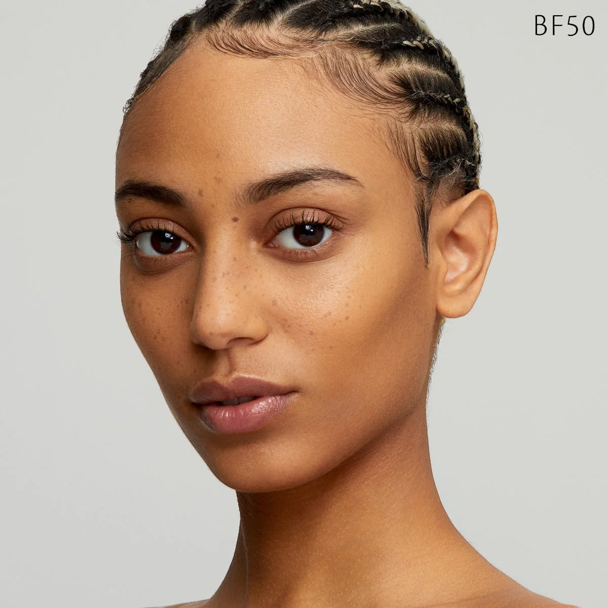 Radiant Fluid Foundation Natural Broad Spectrum SPF 25 Sunscreen - Image 55